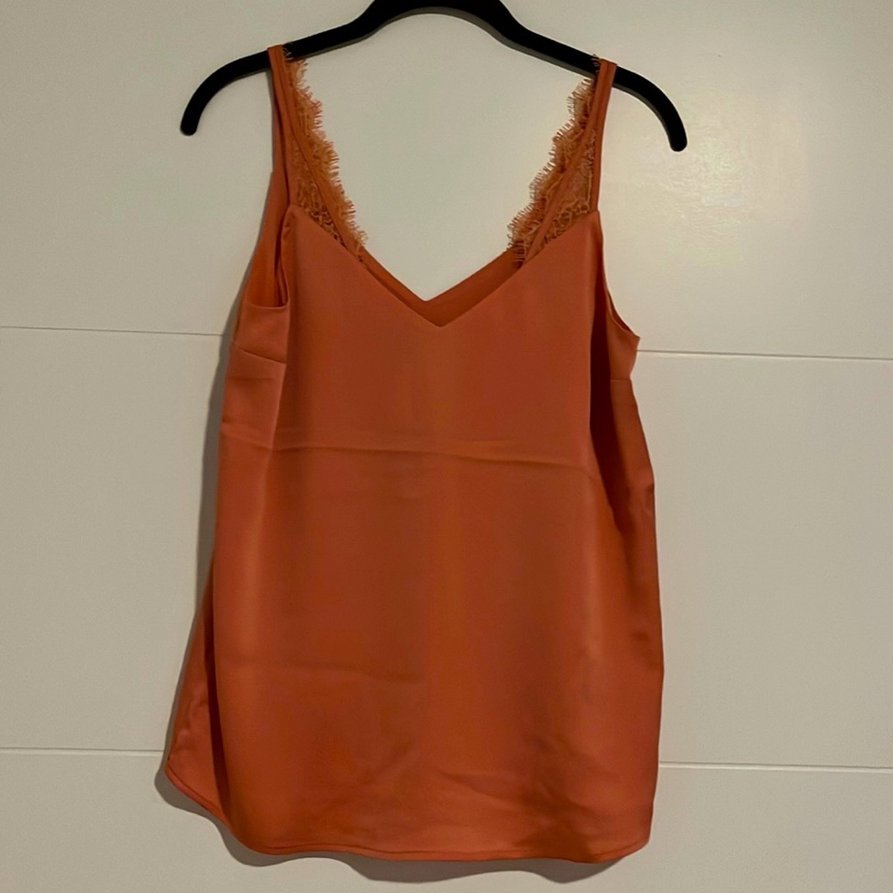 Satin top. Express. Lace detail.